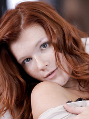 Redhead beauty posing hot