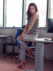 Nici Dee portrays a corporate hottie who loves loves seducing new hires into her private office for a 'closed-door meeting'.