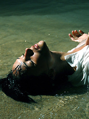 Top Model Jenya sports her colorful bikini for a little while before loosing control.