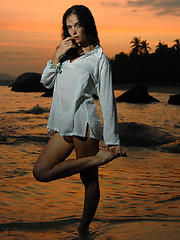 Top Model Jenya sports her colorful bikini for a little while before loosing control.