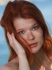 Mia Sollis plays naked by the river