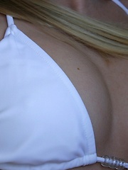 Watch as Skye washes her car in a tiny white bikini