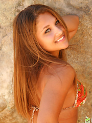 Watch as Lili strips out of her bikini at the beach