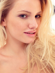 Watch Monique C tease out of her clothes while she gets ready in a mirror.