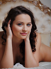 Ardelia A may look sweet and adorable but this cutie can lure you into lusty desires as she poses seductively all over the bed.