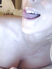 xoGisele wears a tight nude and black sexy body suit as she strips and fingers herself on her bed