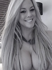 xoGisele wears a crotchless body suit and has some fun in front of the webcam