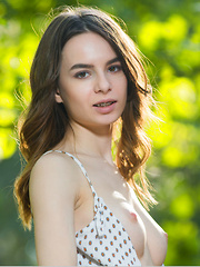 Debora A strips outdoors baring her sexy, tight body.